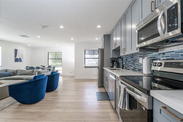 Interior, Kitchen, Living room, Recessed Lighting, Stainless Steel Appliances, Wood Texture Flooring