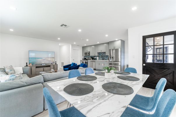 Dining room, Interior, Kitchen, Living room, Recessed Lighting, Stainless Steel Appliances, Wood Texture Flooring