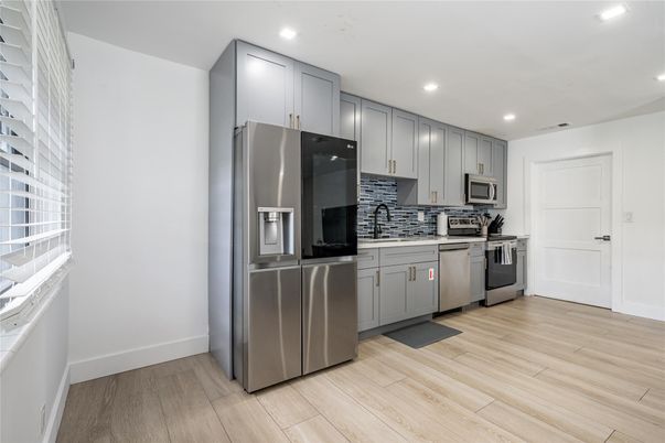 Interior, Kitchen, Recessed Lighting, Stainless Steel Appliances, Wood Texture Flooring