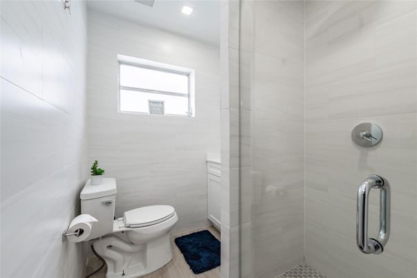 Bathroom, Glass Shower, Interior, Recessed Lighting, Wood Texture Flooring