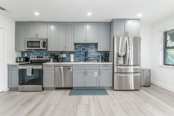Interior, Kitchen, Recessed Lighting, Stainless Steel Appliances, Wood Texture Flooring