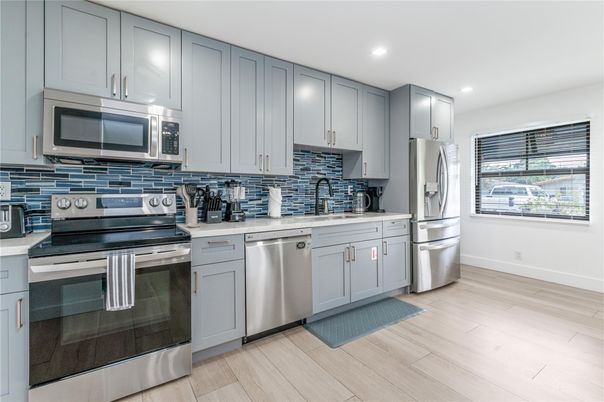 Interior, Kitchen, Recessed Lighting, Stainless Steel Appliances, Wood Texture Flooring