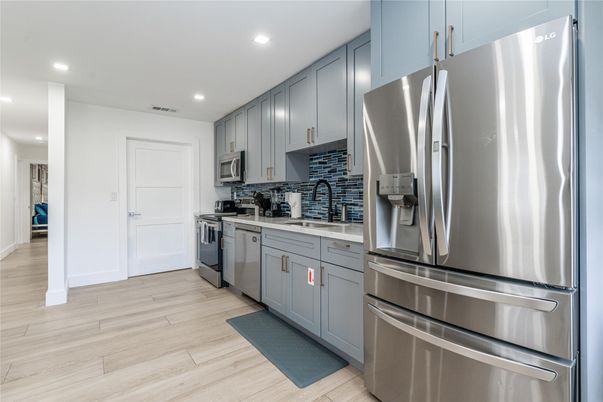 Interior, Kitchen, Recessed Lighting, Stainless Steel Appliances, Wood Texture Flooring