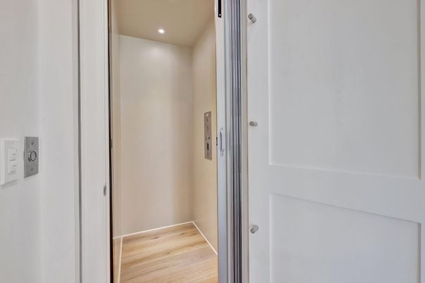 Elevator, Interior, Recessed Lighting, Wood Texture Flooring