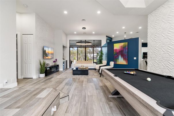 Billiard Table, Game Room, Interior, Living room, Pendant Lights, Recessed Lighting, Wood Texture Flooring