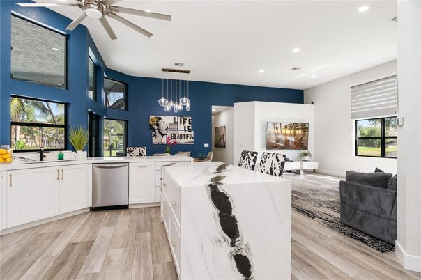 Dining room, Interior, Kitchen, Pendant Lights, Recessed Lighting, Stainless Steel Appliances, Wood Texture Flooring