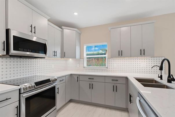 Interior, Kitchen, Recessed Lighting, Stainless Steel Appliances, Wood Texture Flooring