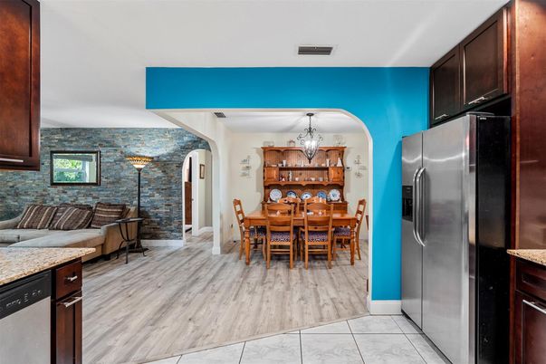 Chandelier, Dining room, Interior, Kitchen, Pendant Lights, Stone Walls, Wood Texture Flooring
