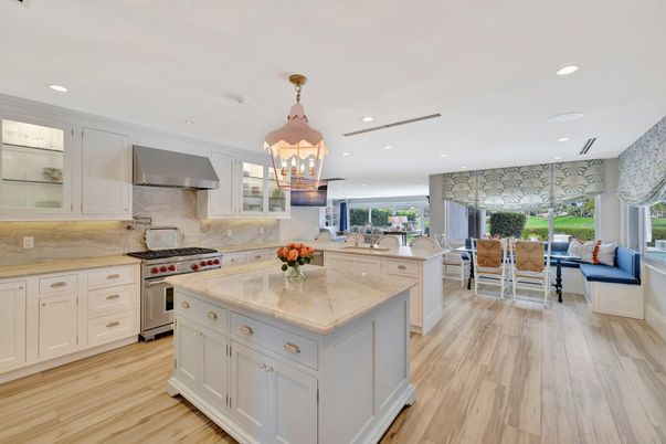 Chandelier, Dining room, Interior, Kitchen, Pendant Lights, Recessed Lighting, Stainless Steel Appliances, Wood Texture Flooring