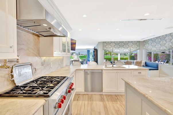 Interior, Kitchen, Marble Walls, Recessed Lighting, Stainless Steel Appliances, Water, Wood Texture Flooring