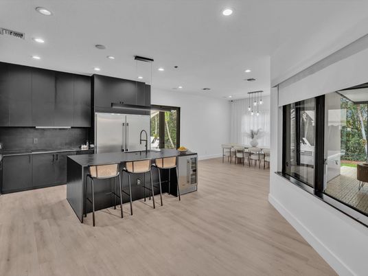 Dining room, Interior, Kitchen, Pendant Lights, Recessed Lighting, Stainless Steel Appliances, Wood Texture Flooring