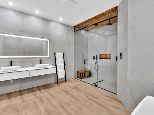Bathroom, Glass Shower, Interior, Marble Walls, Recessed Lighting, Wood Texture Flooring