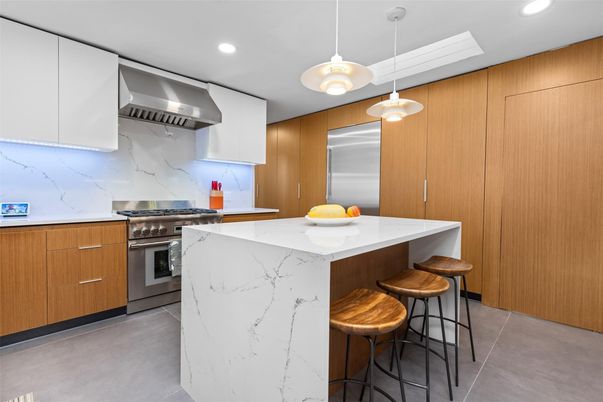 Interior, Kitchen, Marble Walls, Pendant Lights, Recessed Lighting, Stainless Steel Appliances