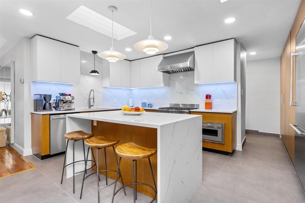 Interior, Kitchen, Marble Walls, Pendant Lights, Recessed Lighting, Stainless Steel Appliances