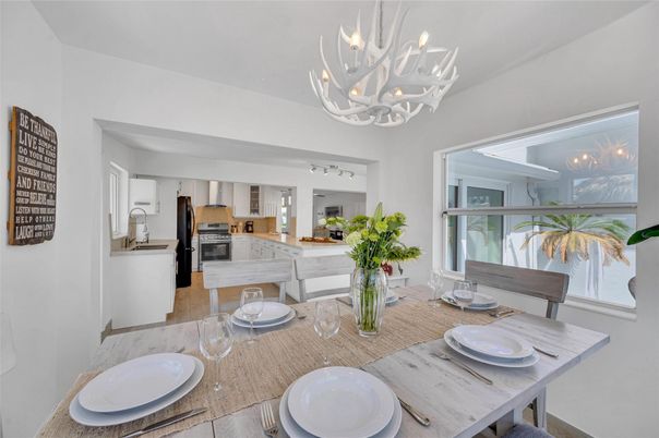 Chandelier, Dining room, Interior, Kitchen, Stainless Steel Appliances, Wood Texture Flooring