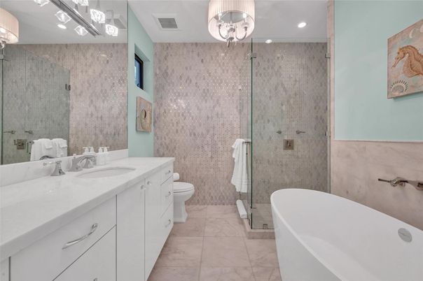 Bathroom, Dual Sink Vanities, Free Standing Baths, Glass Shower, Interior, Marble, Recessed Lighting