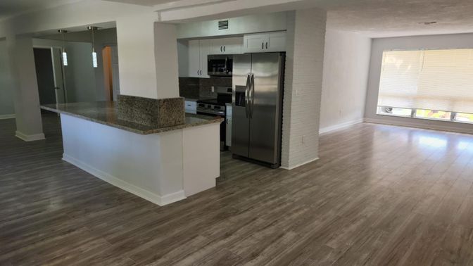 Empty room, Interior, Kitchen, Stainless Steel Appliances, Wood Texture Flooring