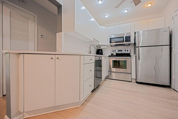 Interior, Kitchen, Recessed Lighting, Stainless Steel Appliances, Wood Texture Flooring