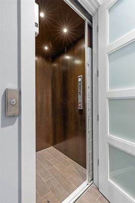 Elevator, Interior, Recessed Lighting, Wooden Ceilings, Wooden Walls