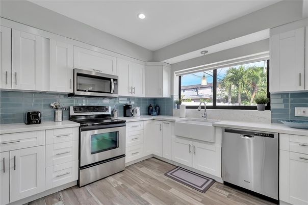 Interior, Kitchen, Recessed Lighting, Stainless Steel Appliances, Wood Texture Flooring