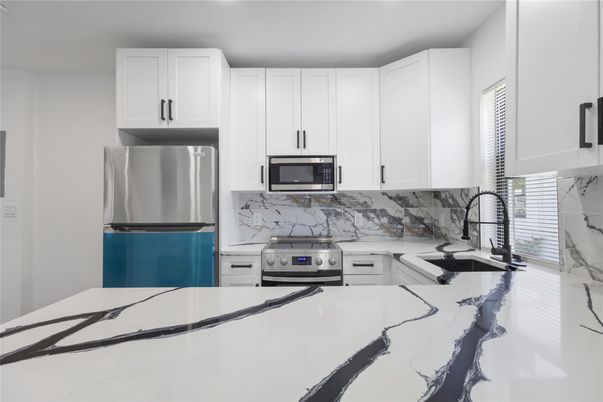 Interior, Kitchen, Marble Walls, Stainless Steel Appliances