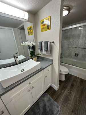 Bathroom, Dual Sink Vanities, Glass Shower, Interior, Wood Texture Flooring