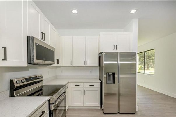 Interior, Kitchen, Recessed Lighting, Stainless Steel Appliances, Wood Texture Flooring