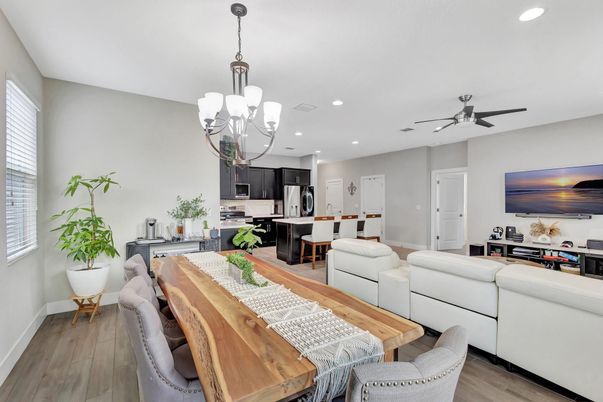 Chandelier, Dining room, Interior, Kitchen, Living room, Recessed Lighting, Stainless Steel Appliances, Wood Texture Flooring