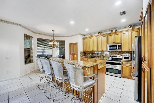 Chandelier, Dining room, Interior, Kitchen, Recessed Lighting, Stainless Steel Appliances