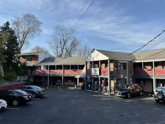 Exterior, Facade, Brick Facade, Condo Building