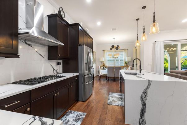 Interior, Kitchen, Pendant Lights, Recessed Lighting, Stainless Steel Appliances, Wood Texture Flooring