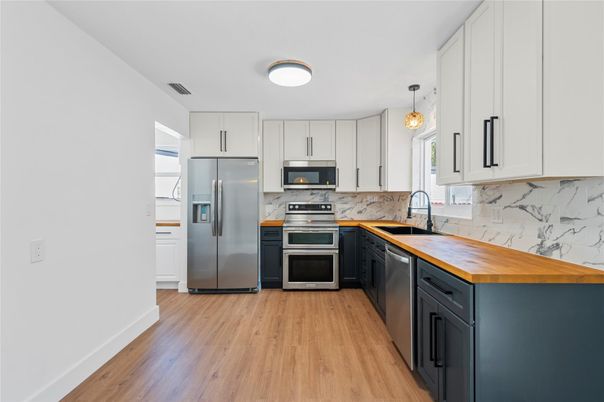 Interior, Kitchen, Pendant Lights, Stainless Steel Appliances, Wood Texture Flooring