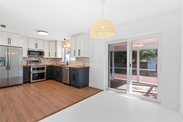 Interior, Kitchen, Pendant Lights, Stainless Steel Appliances, Wood Texture Flooring
