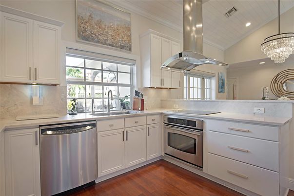 Chandelier, Interior, Kitchen, Recessed Lighting, Stainless Steel Appliances, Wood Texture Flooring