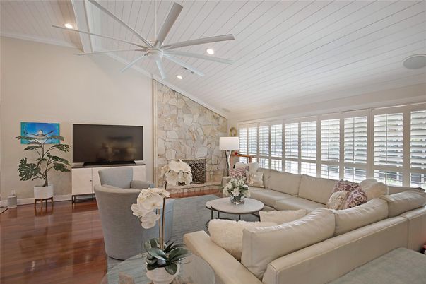 Fireplace, Interior, Living room, Recessed Lighting, Stone Walls, Wood Texture Flooring