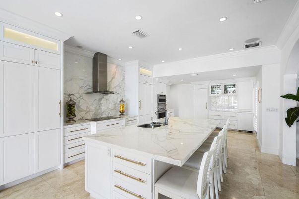 Interior, Kitchen, Marble Walls, Recessed Lighting, Stainless Steel Appliances