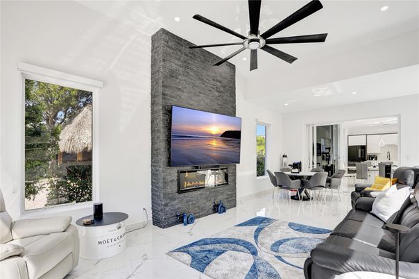 Dining room, Fireplace, Interior, Kitchen, Living room, Marble, Recessed Lighting, Stainless Steel Appliances, Stone Walls