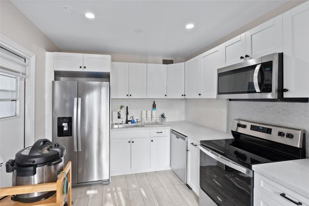 Interior, Kitchen, Recessed Lighting, Stainless Steel Appliances, Wood Texture Flooring
