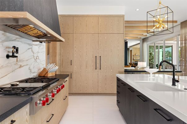 Interior, Kitchen, Marble Walls, Pendant Lights, Recessed Lighting, Stainless Steel Appliances