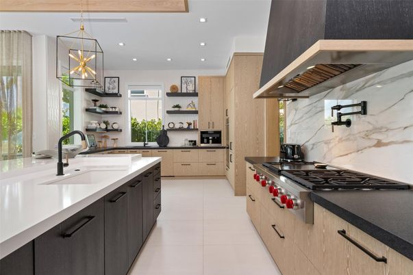 Interior, Kitchen, Marble Walls, Pendant Lights, Recessed Lighting, Stainless Steel Appliances