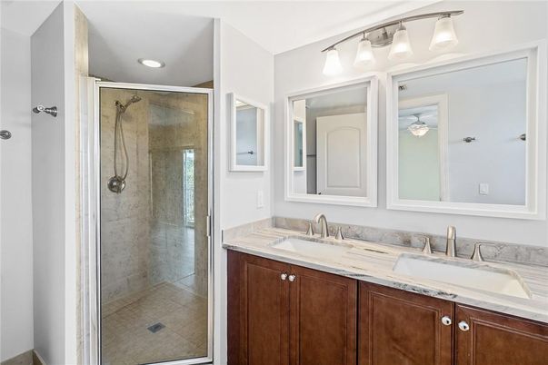 Bathroom, Dual Sink Vanities, Glass Shower, Interior, Recessed Lighting