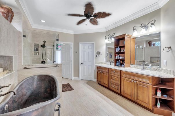 Bathroom, Dual Sink Vanities, Glass Shower, Interior, Recessed Lighting, Wood Texture Flooring