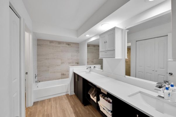 Bathroom, Dual Sink Vanities, Interior, Recessed Lighting, Wood Texture Flooring