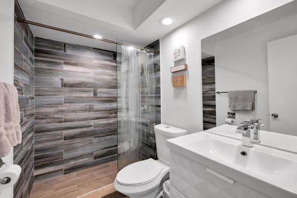 Bathroom, Glass Shower, Interior, Recessed Lighting, Wood Texture Flooring