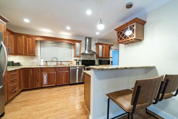 Interior, Kitchen, Pendant Lights, Recessed Lighting, Stainless Steel Appliances, Wood Texture Flooring