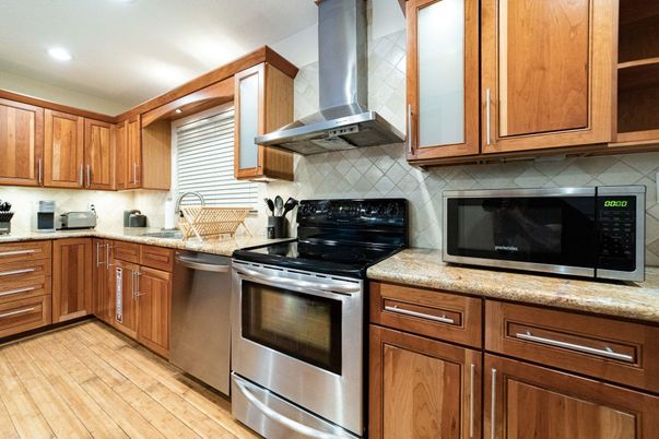 Interior, Kitchen, Recessed Lighting, Stainless Steel Appliances, Wood Texture Flooring