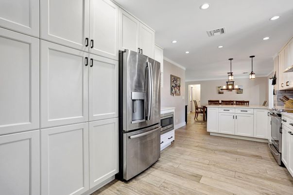 Dining room, Interior, Kitchen, Pendant Lights, Recessed Lighting, Stainless Steel Appliances, Wood Texture Flooring