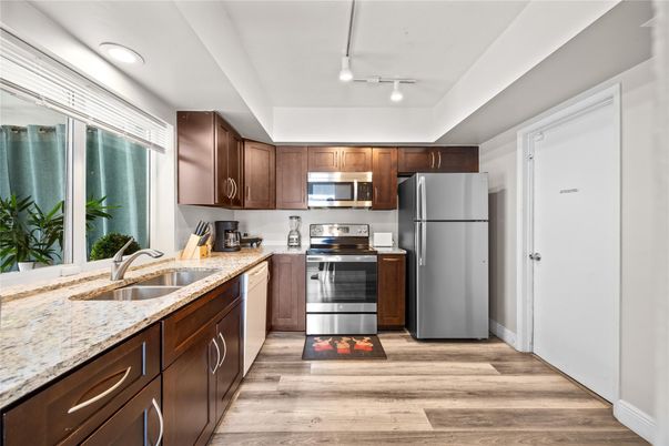 Interior, Kitchen, Recessed Lighting, Stainless Steel Appliances, Wood Texture Flooring
