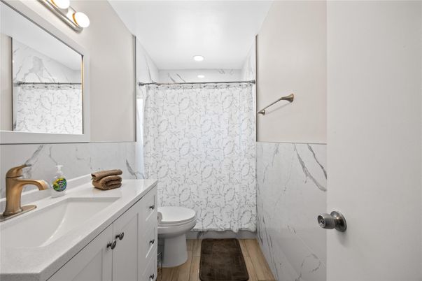 Bathroom, Interior, Marble Walls, Recessed Lighting, Wood Texture Flooring
