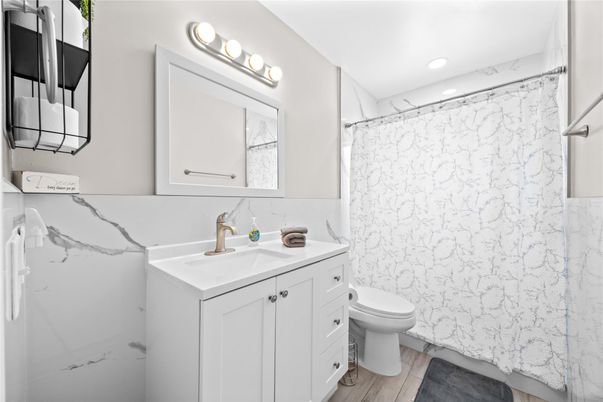 Bathroom, Interior, Marble Walls, Recessed Lighting, Wood Texture Flooring
